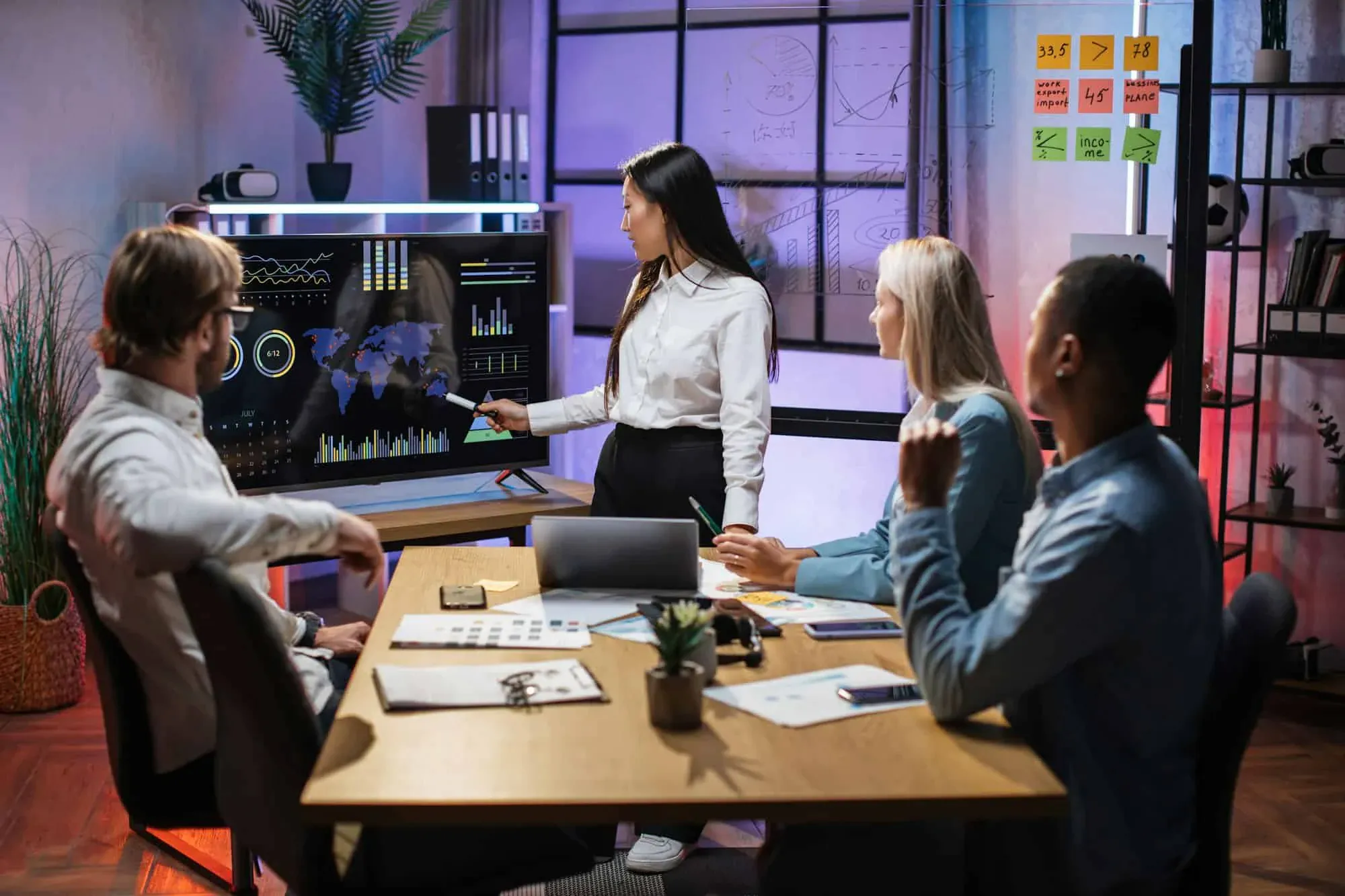 Matjarak Builders digital agency team brainstorming and collaborating on innovative web development projects in the office.